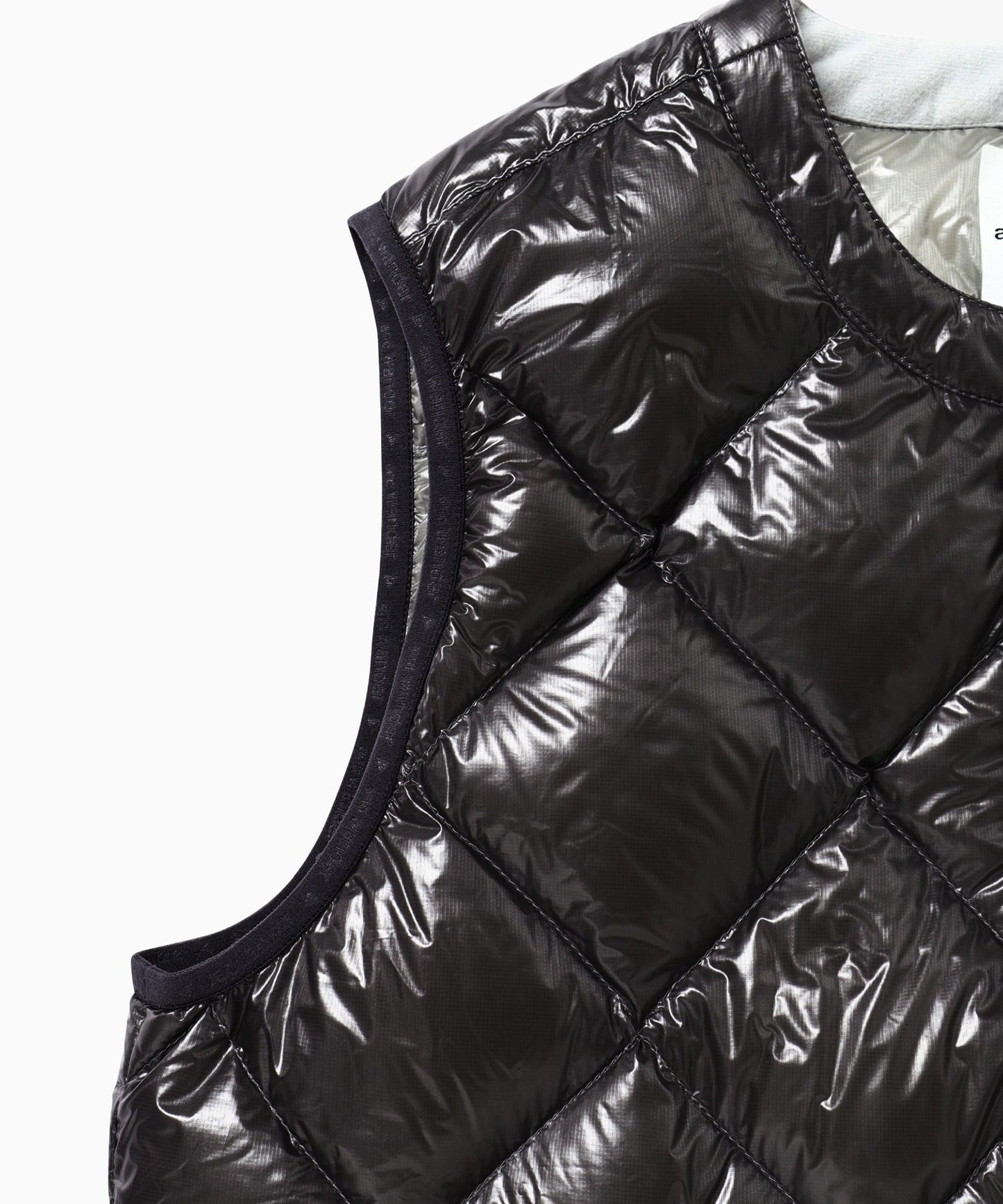 and wander / diamond stitch down vest